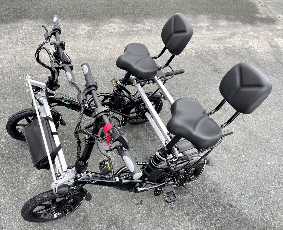 Blackbird Bikes side-by-side bicycles fit Downs Syndrome, Autism, Cerebral Palsy, TBI, and other cyclists with adaptive needs. This Fiido D3 Pro is connected with a compact Go4-E Connection Kit