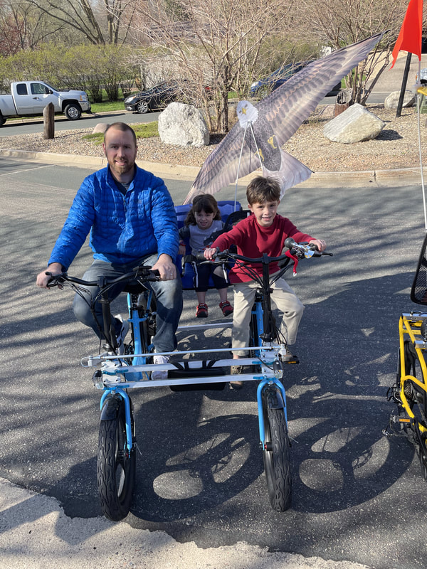 Not your grandparents' tandem bicycle. The Blackbird Bikes Go4-E Connection Kit fits this family of three with extra room for smiles.