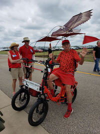 Two low step-through eBikes combine to make a quad bike, or 4 wheeled pedal vehicle, for sociable bike riding.